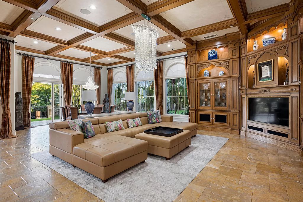 Nestled on a prime 1.06-acre waterfront estate at 5001 Egret Point Circle, Boca Raton, this Italianate marvel in The Sanctuary presents 8 bedrooms, 14 baths, and 14,848 square feet of opulent living space, meticulously crafted in 2005.