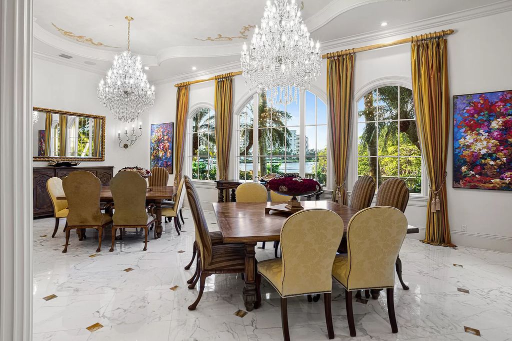 Nestled on a prime 1.06-acre waterfront estate at 5001 Egret Point Circle, Boca Raton, this Italianate marvel in The Sanctuary presents 8 bedrooms, 14 baths, and 14,848 square feet of opulent living space, meticulously crafted in 2005.
