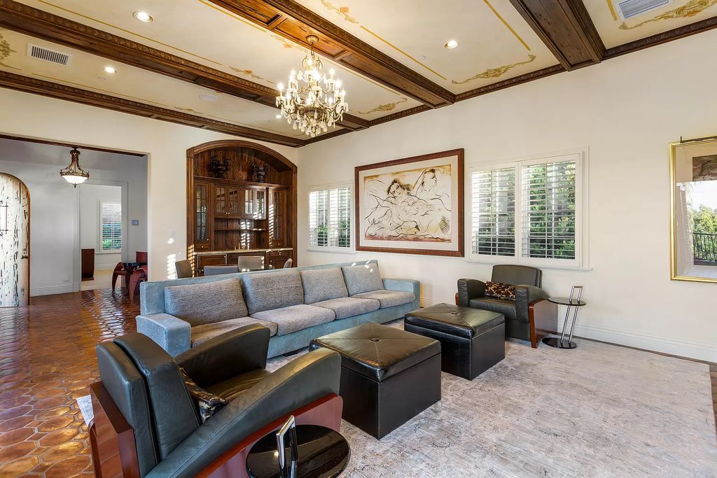 Nestled on a prime 1.06-acre waterfront estate at 5001 Egret Point Circle, Boca Raton, this Italianate marvel in The Sanctuary presents 8 bedrooms, 14 baths, and 14,848 square feet of opulent living space, meticulously crafted in 2005.