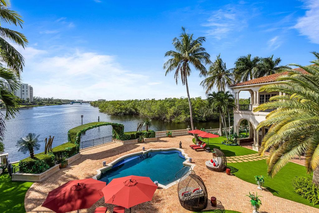 Nestled on a prime 1.06-acre waterfront estate at 5001 Egret Point Circle, Boca Raton, this Italianate marvel in The Sanctuary presents 8 bedrooms, 14 baths, and 14,848 square feet of opulent living space, meticulously crafted in 2005.