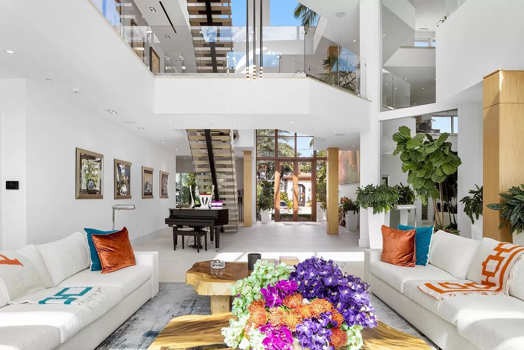 Discover The Isla Bahia Estate, an architectural marvel in Fort Lauderdale's Harbour Beach. With 6 bedrooms, 11 baths, and over 10,800 square feet, this 2018-built waterfront mansion offers unparalleled luxury, boasting a gourmet kitchen, a theater, and an elevator.