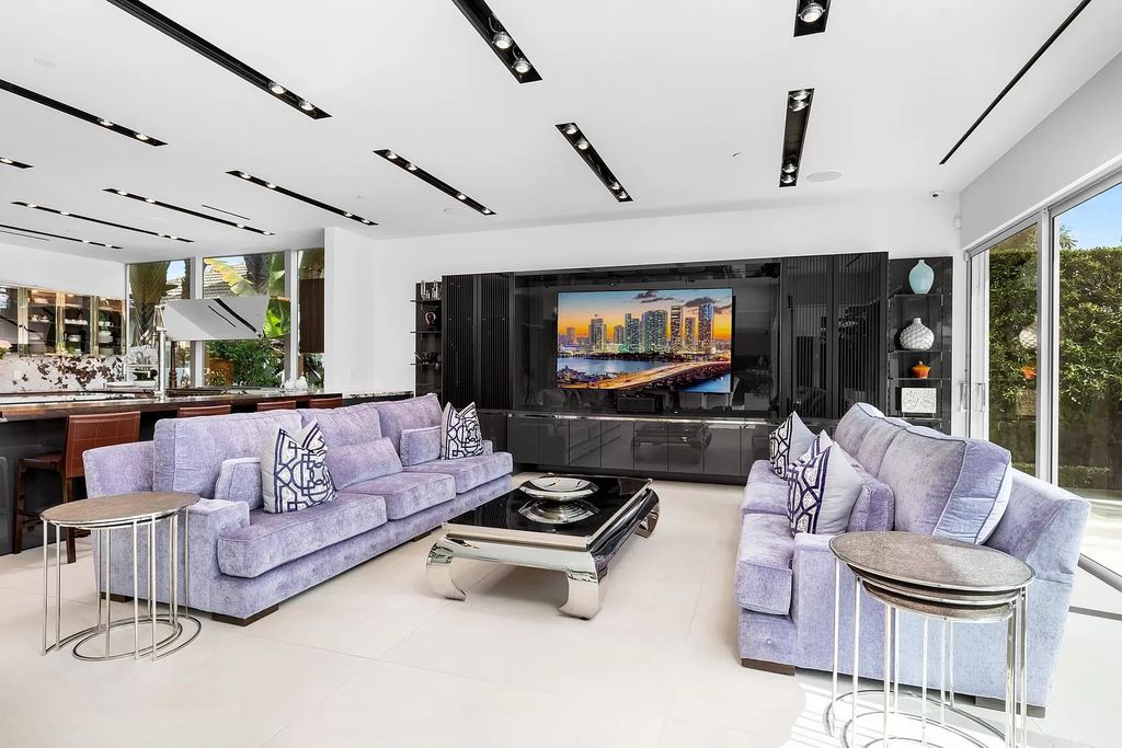 Discover The Isla Bahia Estate, an architectural marvel in Fort Lauderdale's Harbour Beach. With 6 bedrooms, 11 baths, and over 10,800 square feet, this 2018-built waterfront mansion offers unparalleled luxury, boasting a gourmet kitchen, a theater, and an elevator.