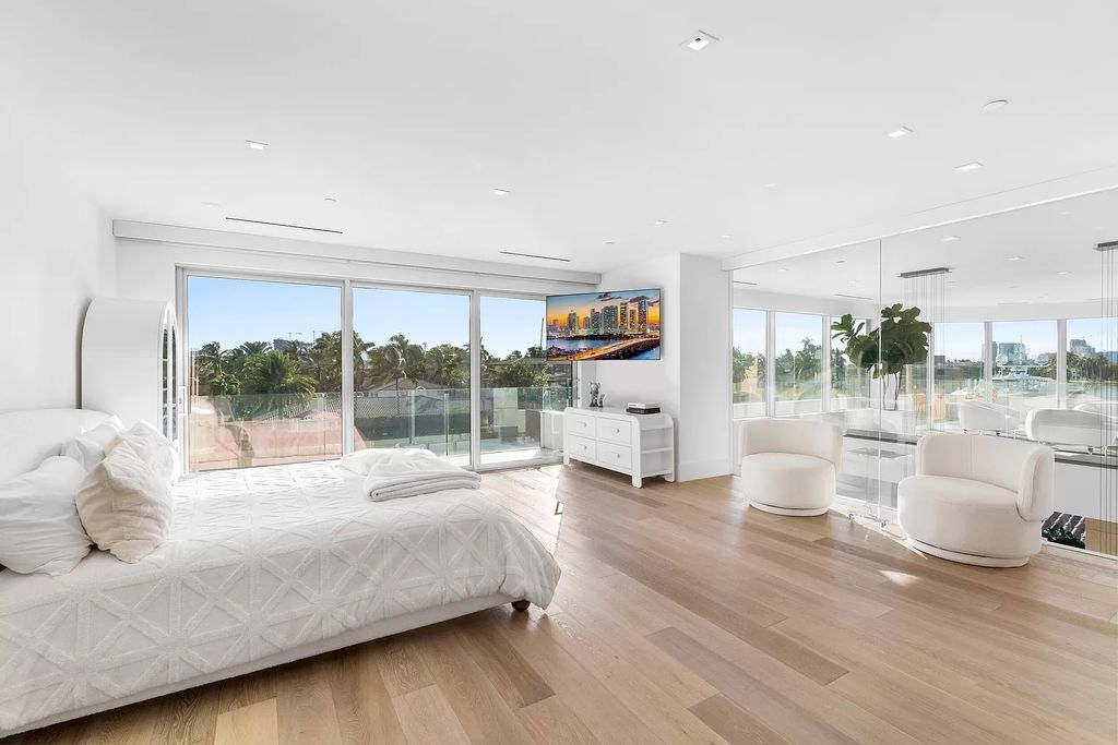 Discover The Isla Bahia Estate, an architectural marvel in Fort Lauderdale's Harbour Beach. With 6 bedrooms, 11 baths, and over 10,800 square feet, this 2018-built waterfront mansion offers unparalleled luxury, boasting a gourmet kitchen, a theater, and an elevator.