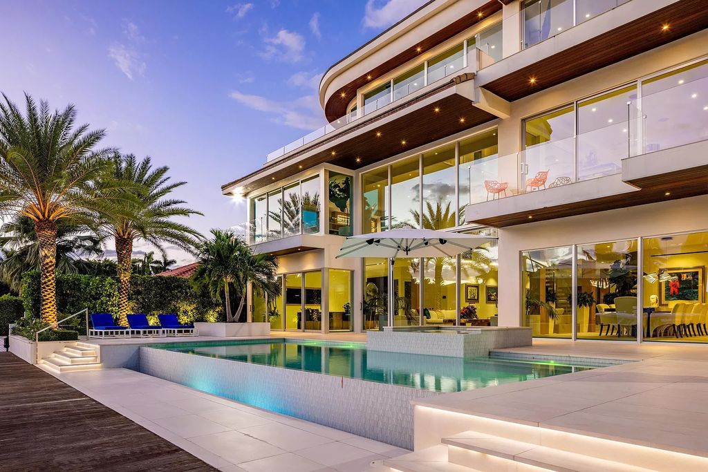 Discover The Isla Bahia Estate, an architectural marvel in Fort Lauderdale's Harbour Beach. With 6 bedrooms, 11 baths, and over 10,800 square feet, this 2018-built waterfront mansion offers unparalleled luxury, boasting a gourmet kitchen, a theater, and an elevator.
