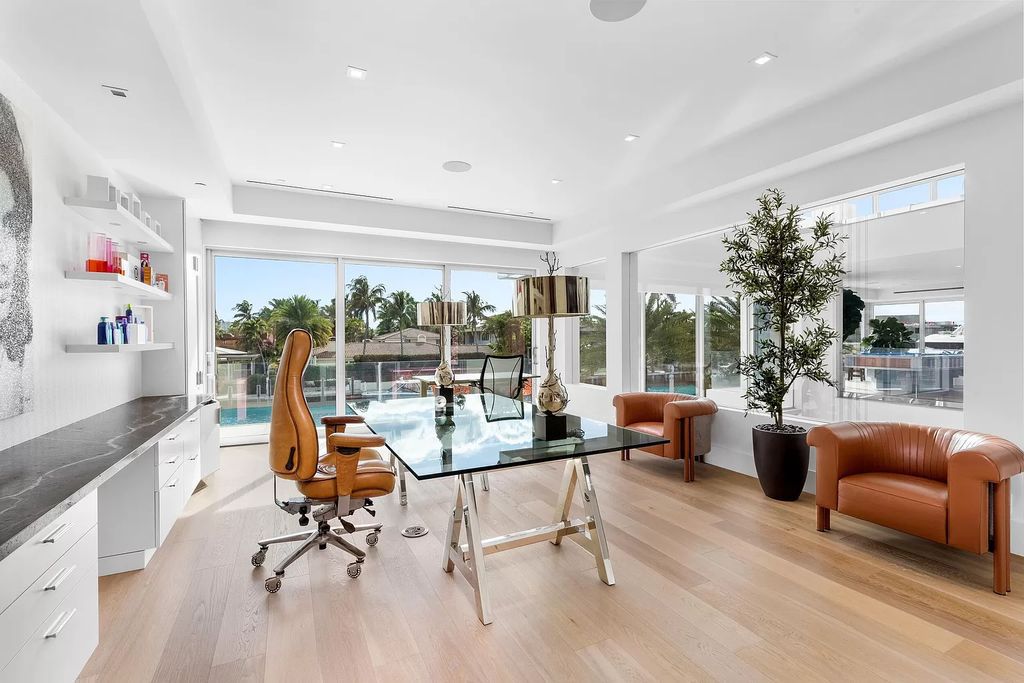 Discover The Isla Bahia Estate, an architectural marvel in Fort Lauderdale's Harbour Beach. With 6 bedrooms, 11 baths, and over 10,800 square feet, this 2018-built waterfront mansion offers unparalleled luxury, boasting a gourmet kitchen, a theater, and an elevator.