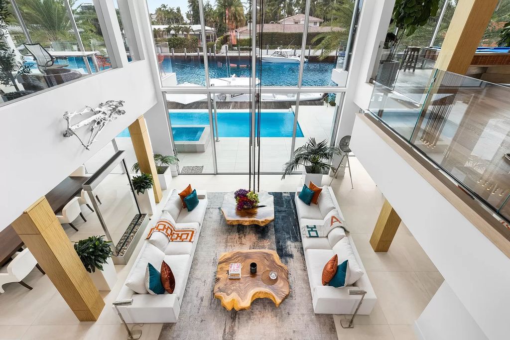 Discover The Isla Bahia Estate, an architectural marvel in Fort Lauderdale's Harbour Beach. With 6 bedrooms, 11 baths, and over 10,800 square feet, this 2018-built waterfront mansion offers unparalleled luxury, boasting a gourmet kitchen, a theater, and an elevator.