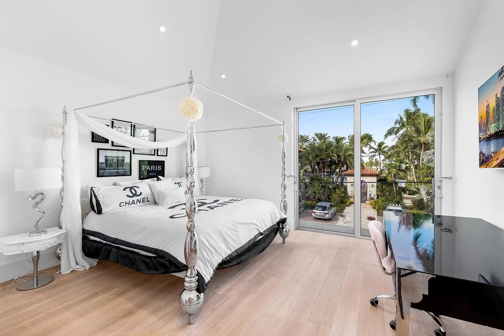Discover The Isla Bahia Estate, an architectural marvel in Fort Lauderdale's Harbour Beach. With 6 bedrooms, 11 baths, and over 10,800 square feet, this 2018-built waterfront mansion offers unparalleled luxury, boasting a gourmet kitchen, a theater, and an elevator.