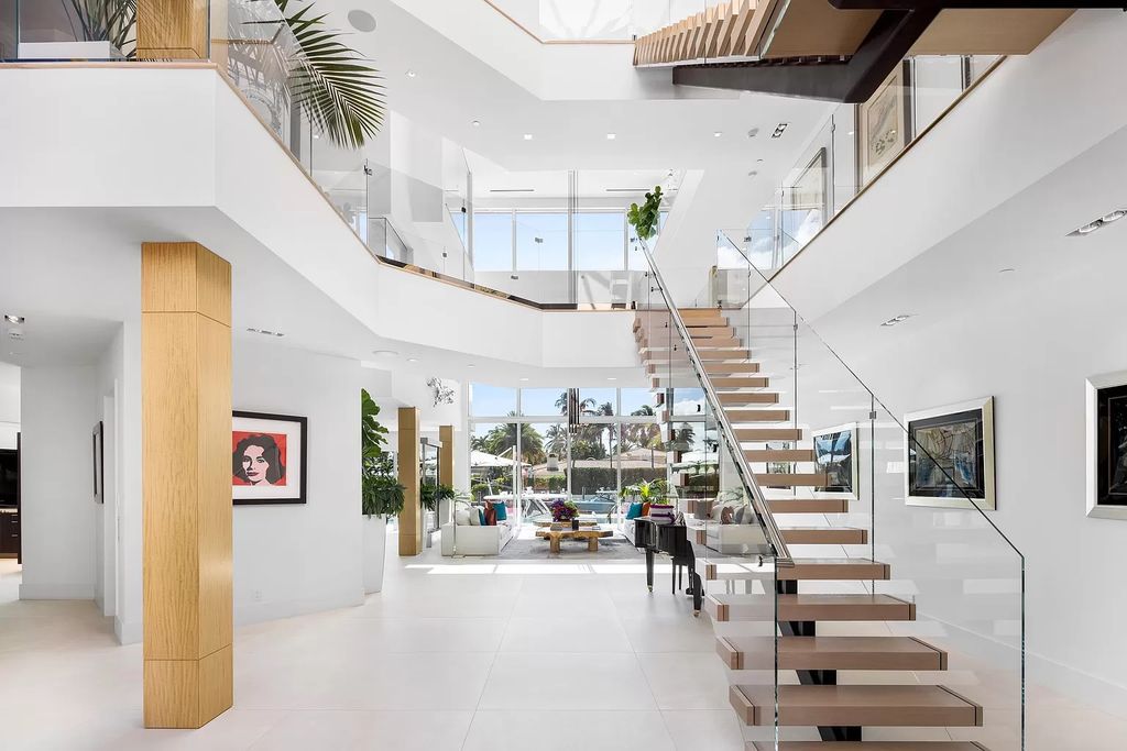 Discover The Isla Bahia Estate, an architectural marvel in Fort Lauderdale's Harbour Beach. With 6 bedrooms, 11 baths, and over 10,800 square feet, this 2018-built waterfront mansion offers unparalleled luxury, boasting a gourmet kitchen, a theater, and an elevator.