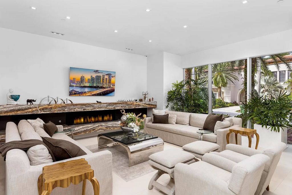 Discover The Isla Bahia Estate, an architectural marvel in Fort Lauderdale's Harbour Beach. With 6 bedrooms, 11 baths, and over 10,800 square feet, this 2018-built waterfront mansion offers unparalleled luxury, boasting a gourmet kitchen, a theater, and an elevator.