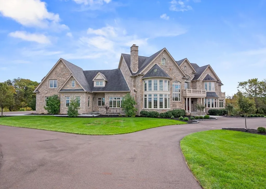 10 Stonebridge Crossing Road Home in Newtown, Pennsylvania. Immerse yourself in the epitome of luxury living with this meticulously crafted 10,000+ sq ft estate by Zavetta Custom Homes. Nestled in Historic Washington Crossing, this exclusive property on Stonebridge Crossing Road offers unparalleled quality, commanding views, and the rare opportunity to enjoy a life of opulence in Bucks County.