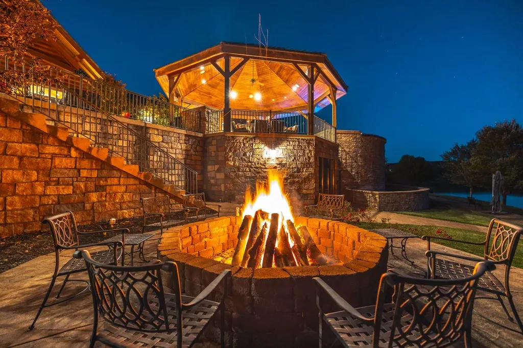 1812 Highway 42 Home in Brumley, Missouri. Discover the enchanting Tradewinds Ranch, a sprawling retreat nestled in Brumley, Missouri, offering a peaceful escape just two hours from both St. Louis and Kansas City. Spanning 1,065 acres, this meticulously crafted Ranch Compound reflects a profound understanding of the land, showcasing premium ranch and equestrian facilities, complemented by multiple residences, including the grand 13,000 sq.ft. main residence.