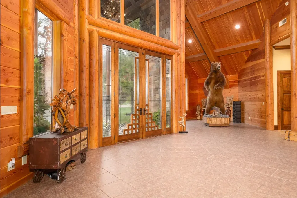 1812 Highway 42 Home in Brumley, Missouri. Discover the enchanting Tradewinds Ranch, a sprawling retreat nestled in Brumley, Missouri, offering a peaceful escape just two hours from both St. Louis and Kansas City. Spanning 1,065 acres, this meticulously crafted Ranch Compound reflects a profound understanding of the land, showcasing premium ranch and equestrian facilities, complemented by multiple residences, including the grand 13,000 sq.ft. main residence.