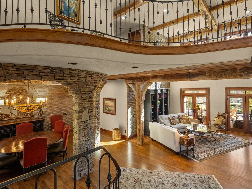 1987 White Tree Trail Home in Arden, North Carolina. Step into luxury living at this exceptional estate home overlooking the signature golf hole at The Cliffs of Walnut Cove. With old-world charm, meticulous details, and stunning mountain views, this residence offers a perfect blend of elegance and golf course living. Indulge in a gourmet kitchen, unique dining experiences, and a serene primary suite.