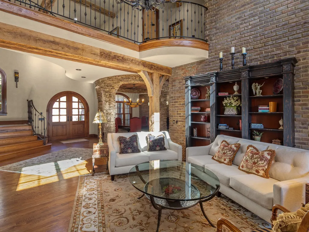 1987 White Tree Trail Home in Arden, North Carolina. Step into luxury living at this exceptional estate home overlooking the signature golf hole at The Cliffs of Walnut Cove. With old-world charm, meticulous details, and stunning mountain views, this residence offers a perfect blend of elegance and golf course living. Indulge in a gourmet kitchen, unique dining experiences, and a serene primary suite.