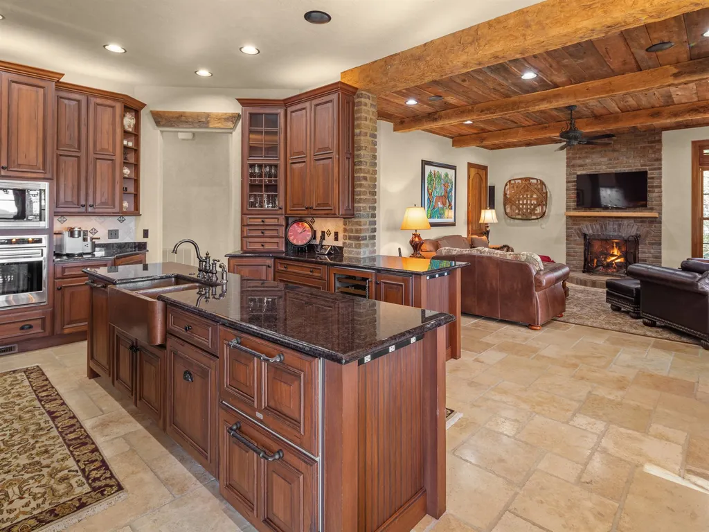 1987 White Tree Trail Home in Arden, North Carolina. Step into luxury living at this exceptional estate home overlooking the signature golf hole at The Cliffs of Walnut Cove. With old-world charm, meticulous details, and stunning mountain views, this residence offers a perfect blend of elegance and golf course living. Indulge in a gourmet kitchen, unique dining experiences, and a serene primary suite.