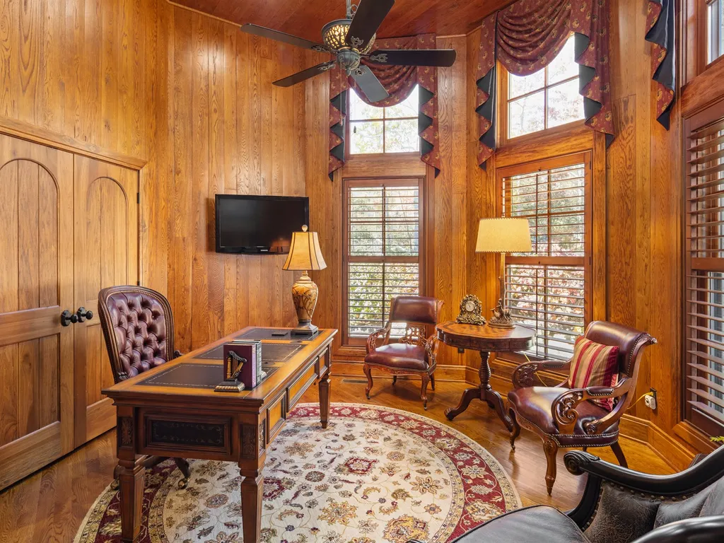 1987 White Tree Trail Home in Arden, North Carolina. Step into luxury living at this exceptional estate home overlooking the signature golf hole at The Cliffs of Walnut Cove. With old-world charm, meticulous details, and stunning mountain views, this residence offers a perfect blend of elegance and golf course living. Indulge in a gourmet kitchen, unique dining experiences, and a serene primary suite.
