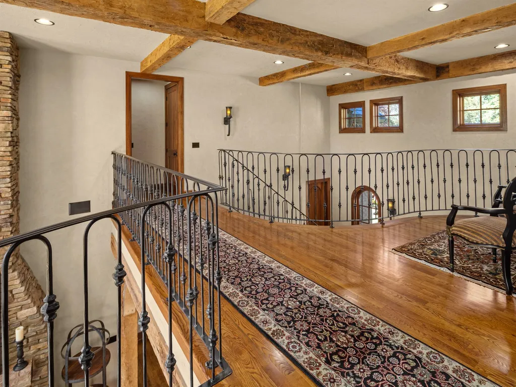 1987 White Tree Trail Home in Arden, North Carolina. Step into luxury living at this exceptional estate home overlooking the signature golf hole at The Cliffs of Walnut Cove. With old-world charm, meticulous details, and stunning mountain views, this residence offers a perfect blend of elegance and golf course living. Indulge in a gourmet kitchen, unique dining experiences, and a serene primary suite.
