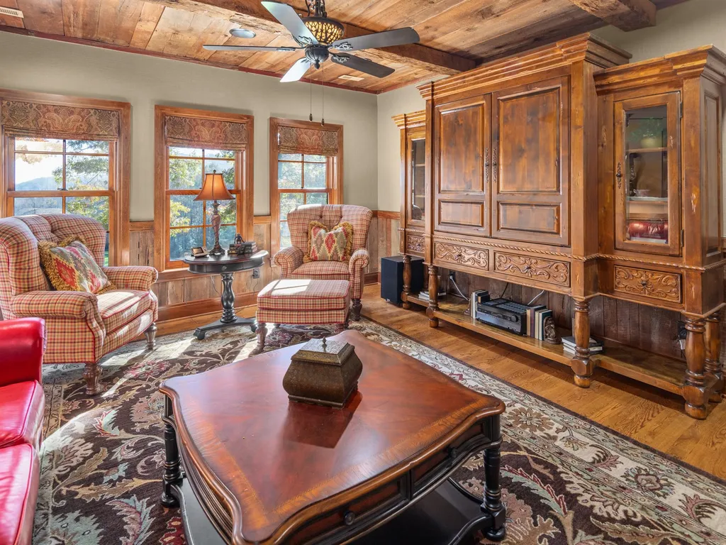 1987 White Tree Trail Home in Arden, North Carolina. Step into luxury living at this exceptional estate home overlooking the signature golf hole at The Cliffs of Walnut Cove. With old-world charm, meticulous details, and stunning mountain views, this residence offers a perfect blend of elegance and golf course living. Indulge in a gourmet kitchen, unique dining experiences, and a serene primary suite.