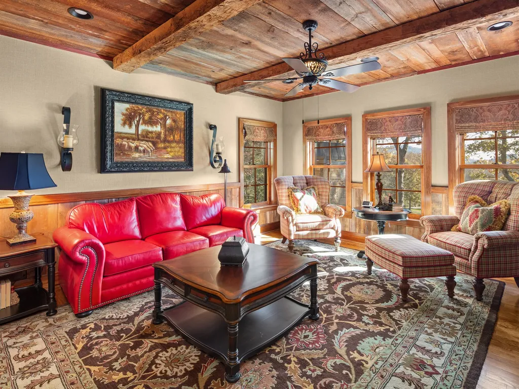 1987 White Tree Trail Home in Arden, North Carolina. Step into luxury living at this exceptional estate home overlooking the signature golf hole at The Cliffs of Walnut Cove. With old-world charm, meticulous details, and stunning mountain views, this residence offers a perfect blend of elegance and golf course living. Indulge in a gourmet kitchen, unique dining experiences, and a serene primary suite.
