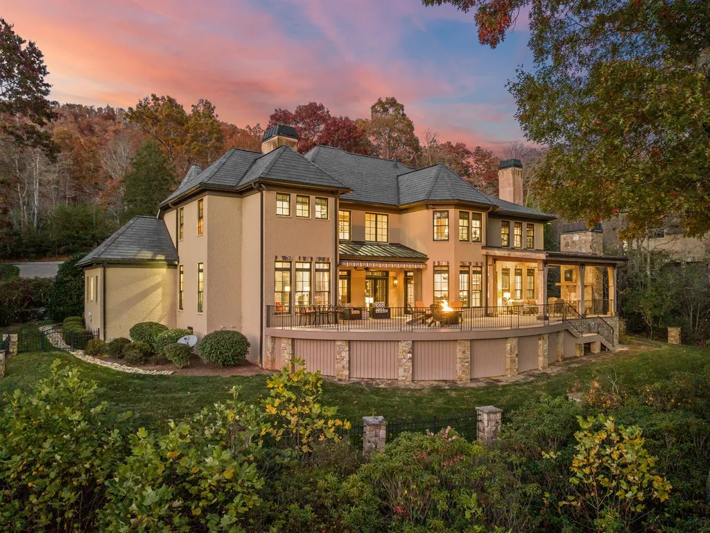 1987 White Tree Trail Home in Arden, North Carolina. Step into luxury living at this exceptional estate home overlooking the signature golf hole at The Cliffs of Walnut Cove. With old-world charm, meticulous details, and stunning mountain views, this residence offers a perfect blend of elegance and golf course living. Indulge in a gourmet kitchen, unique dining experiences, and a serene primary suite.