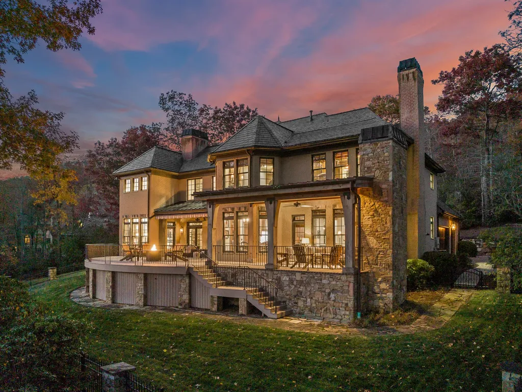 1987 White Tree Trail Home in Arden, North Carolina. Step into luxury living at this exceptional estate home overlooking the signature golf hole at The Cliffs of Walnut Cove. With old-world charm, meticulous details, and stunning mountain views, this residence offers a perfect blend of elegance and golf course living. Indulge in a gourmet kitchen, unique dining experiences, and a serene primary suite.