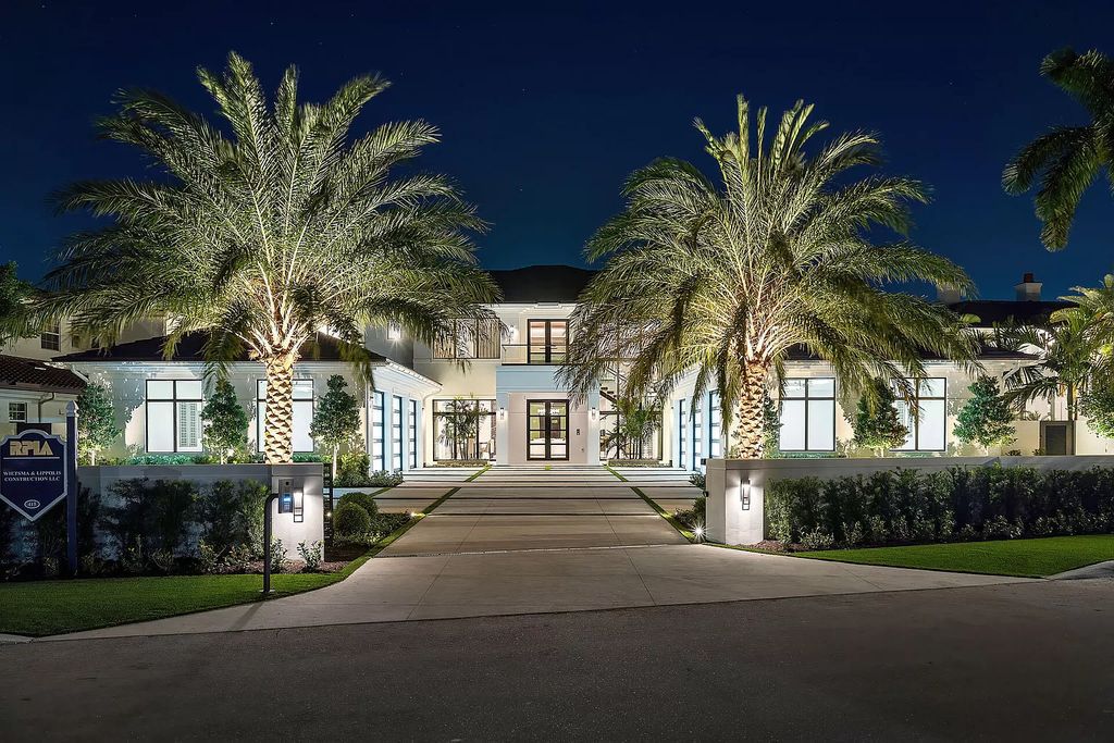 Indulge in the epitome of waterfront luxury at this 10,784-square-foot estate in Royal Palm Yacht & Country Club. Crafted by Wietsma Lippolis Construction, this masterpiece boasts six bedroom suites, expansive living areas curated by Artisan Interiors, and cutting-edge Crestron home technology.