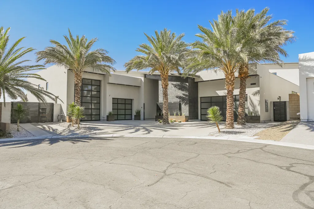 5305 Secluded Brook Court Home in Las Vegas, Nevada. Nestled within the exclusive Serenity Brook Estates at Lone Mountain, this contemporary masterpiece is a true testament to modern luxury living. Situated on a generous half-acre lot, this home offers a seamless fusion of indoor and outdoor spaces.