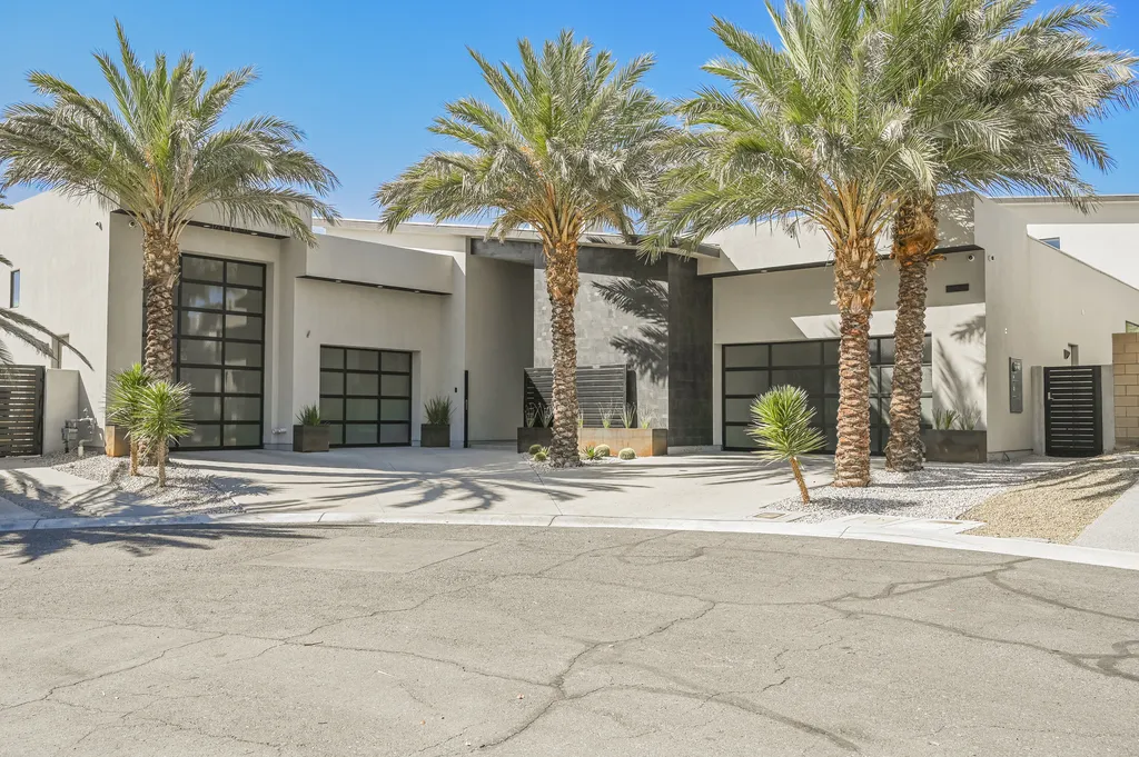 5305 Secluded Brook Court Home in Las Vegas, Nevada. Nestled within the exclusive Serenity Brook Estates at Lone Mountain, this contemporary masterpiece is a true testament to modern luxury living. Situated on a generous half-acre lot, this home offers a seamless fusion of indoor and outdoor spaces.