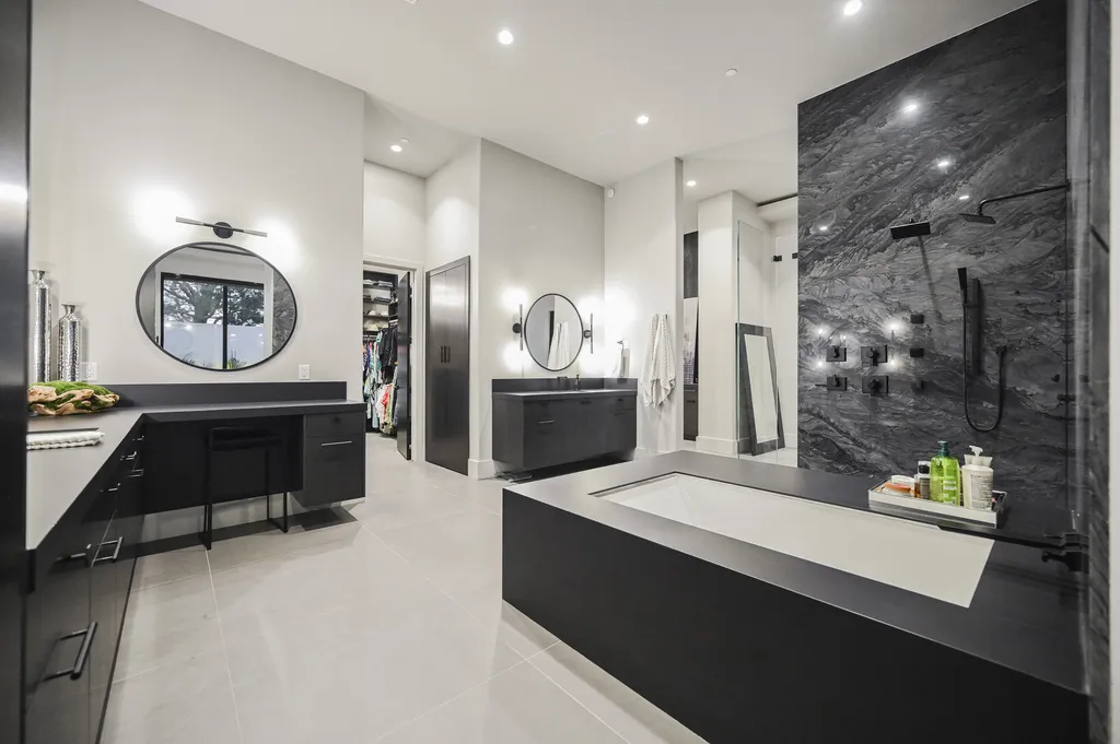 5305 Secluded Brook Court Home in Las Vegas, Nevada. Nestled within the exclusive Serenity Brook Estates at Lone Mountain, this contemporary masterpiece is a true testament to modern luxury living. Situated on a generous half-acre lot, this home offers a seamless fusion of indoor and outdoor spaces.