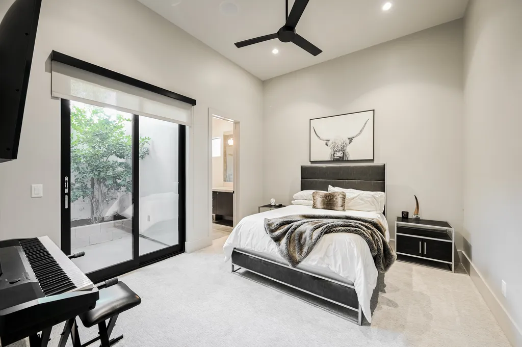 5305 Secluded Brook Court Home in Las Vegas, Nevada. Nestled within the exclusive Serenity Brook Estates at Lone Mountain, this contemporary masterpiece is a true testament to modern luxury living. Situated on a generous half-acre lot, this home offers a seamless fusion of indoor and outdoor spaces.
