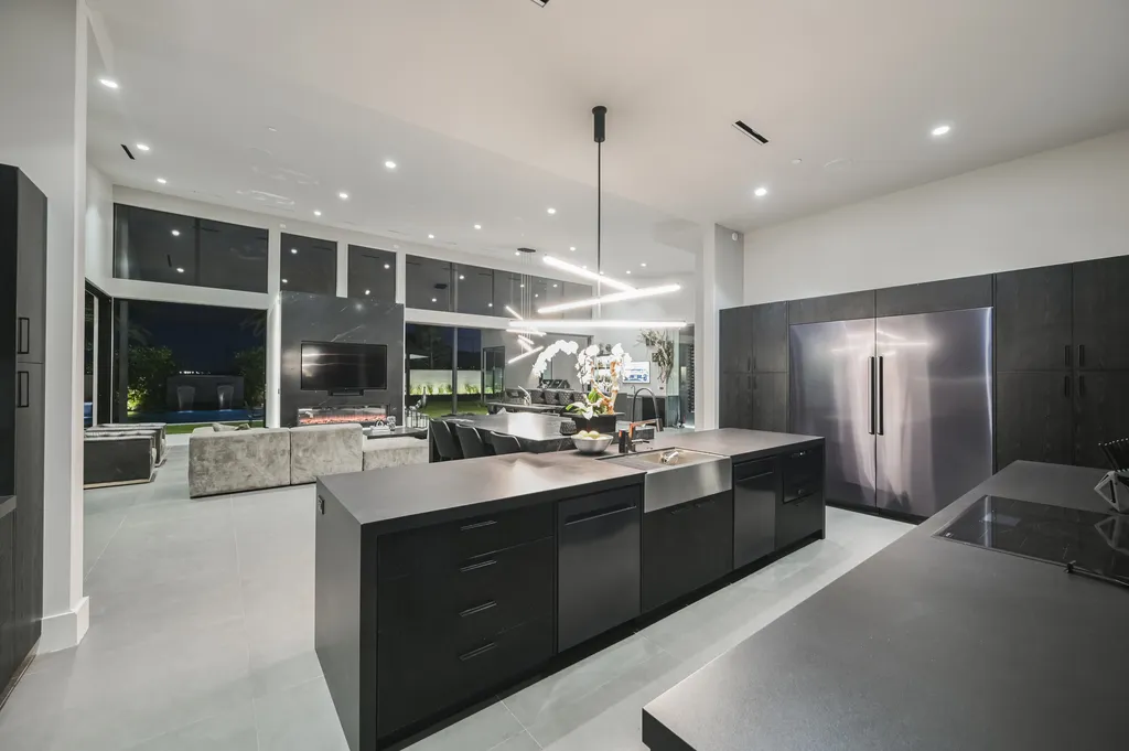 5305 Secluded Brook Court Home in Las Vegas, Nevada. Nestled within the exclusive Serenity Brook Estates at Lone Mountain, this contemporary masterpiece is a true testament to modern luxury living. Situated on a generous half-acre lot, this home offers a seamless fusion of indoor and outdoor spaces.