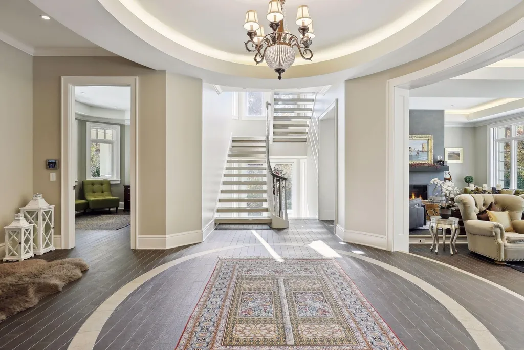 5790 Jasmine Lane SW Home in Rochester, Minnesota. Discover unparalleled luxury in this 11,000 SF architectural masterpiece by renowned architect John McMiller. Nestled on a private lot, this smart home is a blend of elegance and technology, featuring a pool deck, theater room, and heated floors throughout.