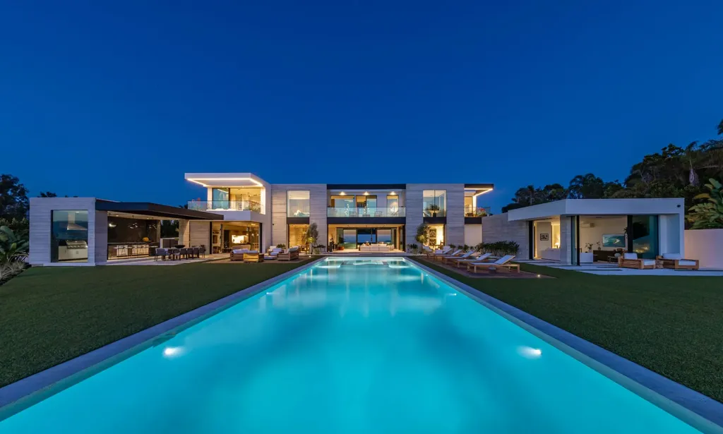 6889 Dume Drive Home in Malibu, California. Immerse yourself in the epitome of Malibu living with this newly completed 8,500 SF modern organic retreat in Little Dume. Developed and designed by Charles Kotliar and architect Doug Burdge, this ocean-view oasis offers 6 BD, 8 BA, customizations like board form concrete walls, oak woods, and curated stones. 