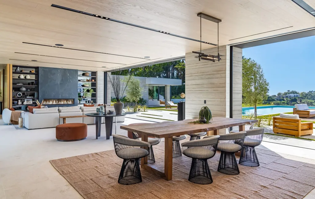 6889 Dume Drive Home in Malibu, California. Immerse yourself in the epitome of Malibu living with this newly completed 8,500 SF modern organic retreat in Little Dume. Developed and designed by Charles Kotliar and architect Doug Burdge, this ocean-view oasis offers 6 BD, 8 BA, customizations like board form concrete walls, oak woods, and curated stones. 