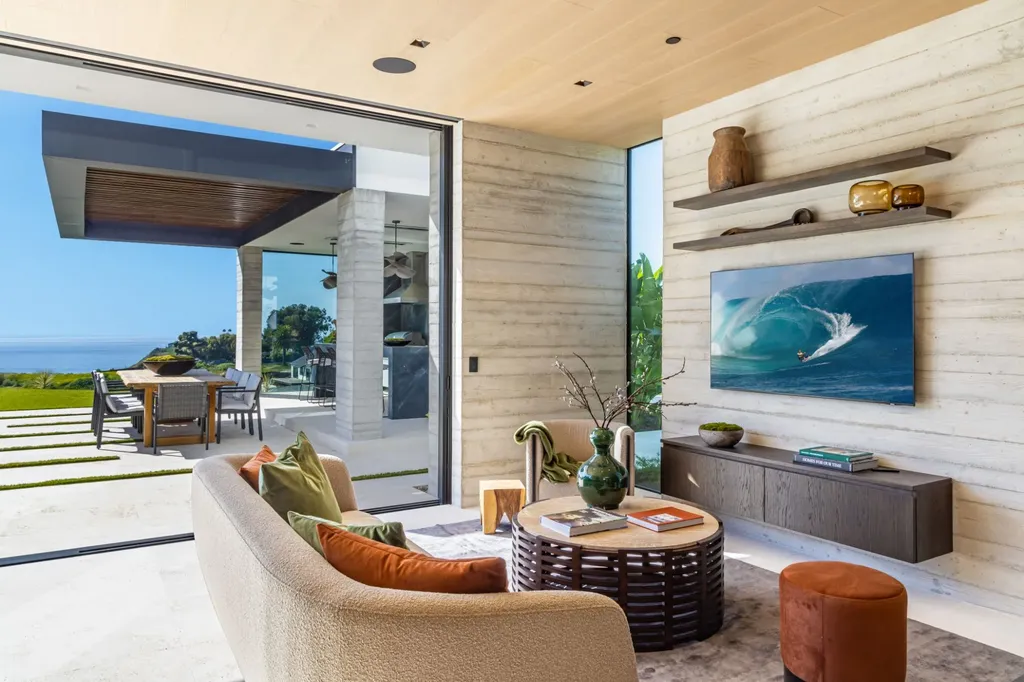 6889 Dume Drive Home in Malibu, California. Immerse yourself in the epitome of Malibu living with this newly completed 8,500 SF modern organic retreat in Little Dume. Developed and designed by Charles Kotliar and architect Doug Burdge, this ocean-view oasis offers 6 BD, 8 BA, customizations like board form concrete walls, oak woods, and curated stones. 