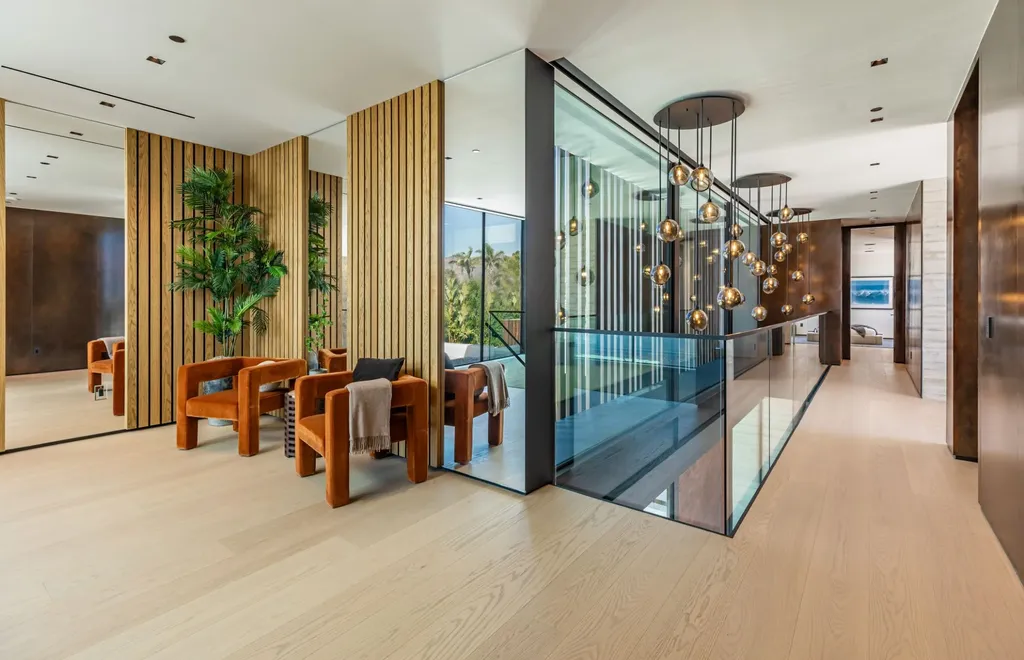 6889 Dume Drive Home in Malibu, California. Immerse yourself in the epitome of Malibu living with this newly completed 8,500 SF modern organic retreat in Little Dume. Developed and designed by Charles Kotliar and architect Doug Burdge, this ocean-view oasis offers 6 BD, 8 BA, customizations like board form concrete walls, oak woods, and curated stones. 