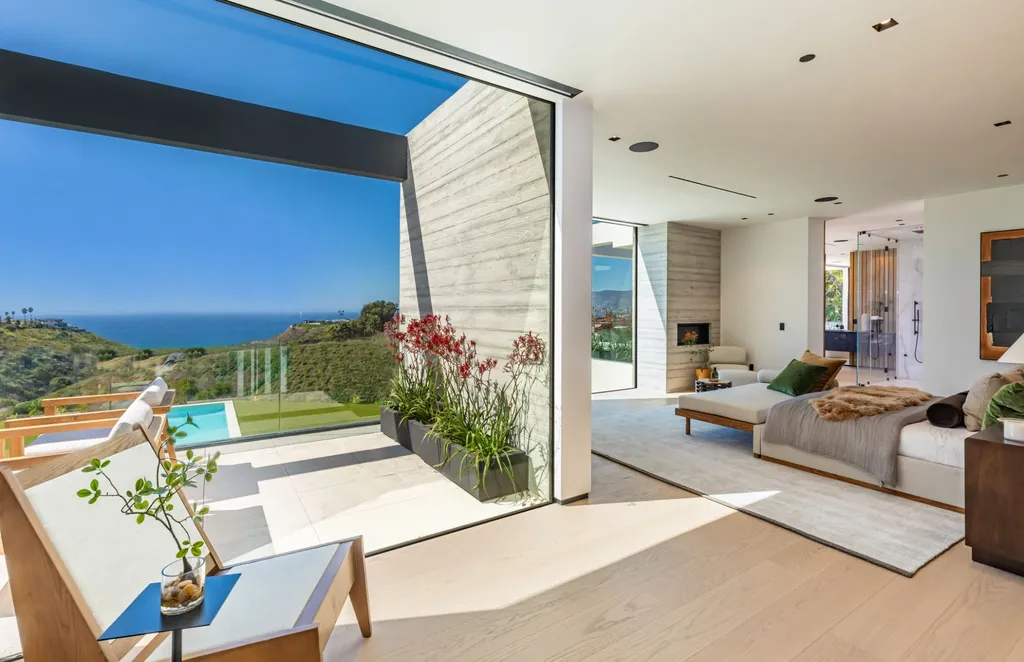 6889 Dume Drive Home in Malibu, California. Immerse yourself in the epitome of Malibu living with this newly completed 8,500 SF modern organic retreat in Little Dume. Developed and designed by Charles Kotliar and architect Doug Burdge, this ocean-view oasis offers 6 BD, 8 BA, customizations like board form concrete walls, oak woods, and curated stones. 