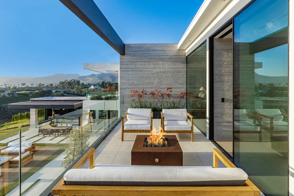 6889 Dume Drive Home in Malibu, California. Immerse yourself in the epitome of Malibu living with this newly completed 8,500 SF modern organic retreat in Little Dume. Developed and designed by Charles Kotliar and architect Doug Burdge, this ocean-view oasis offers 6 BD, 8 BA, customizations like board form concrete walls, oak woods, and curated stones. 