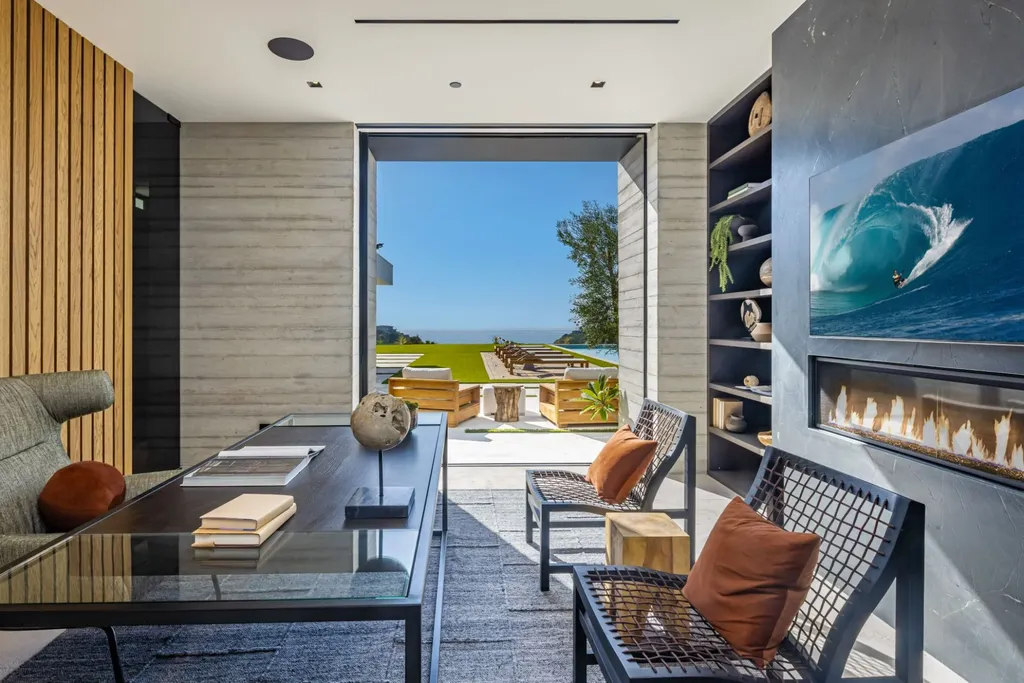6889 Dume Drive Home in Malibu, California. Immerse yourself in the epitome of Malibu living with this newly completed 8,500 SF modern organic retreat in Little Dume. Developed and designed by Charles Kotliar and architect Doug Burdge, this ocean-view oasis offers 6 BD, 8 BA, customizations like board form concrete walls, oak woods, and curated stones. 