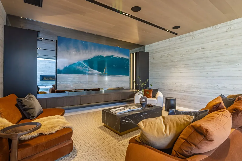 6889 Dume Drive Home in Malibu, California. Immerse yourself in the epitome of Malibu living with this newly completed 8,500 SF modern organic retreat in Little Dume. Developed and designed by Charles Kotliar and architect Doug Burdge, this ocean-view oasis offers 6 BD, 8 BA, customizations like board form concrete walls, oak woods, and curated stones. 