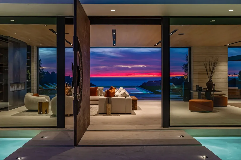 6889 Dume Drive Home in Malibu, California. Immerse yourself in the epitome of Malibu living with this newly completed 8,500 SF modern organic retreat in Little Dume. Developed and designed by Charles Kotliar and architect Doug Burdge, this ocean-view oasis offers 6 BD, 8 BA, customizations like board form concrete walls, oak woods, and curated stones. 
