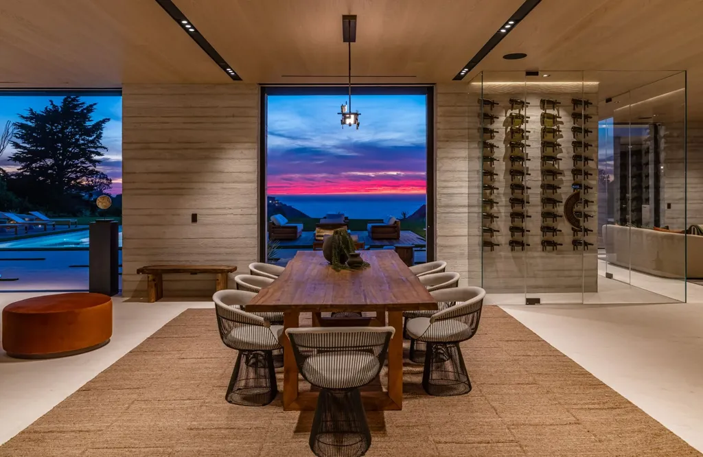 6889 Dume Drive Home in Malibu, California. Immerse yourself in the epitome of Malibu living with this newly completed 8,500 SF modern organic retreat in Little Dume. Developed and designed by Charles Kotliar and architect Doug Burdge, this ocean-view oasis offers 6 BD, 8 BA, customizations like board form concrete walls, oak woods, and curated stones. 