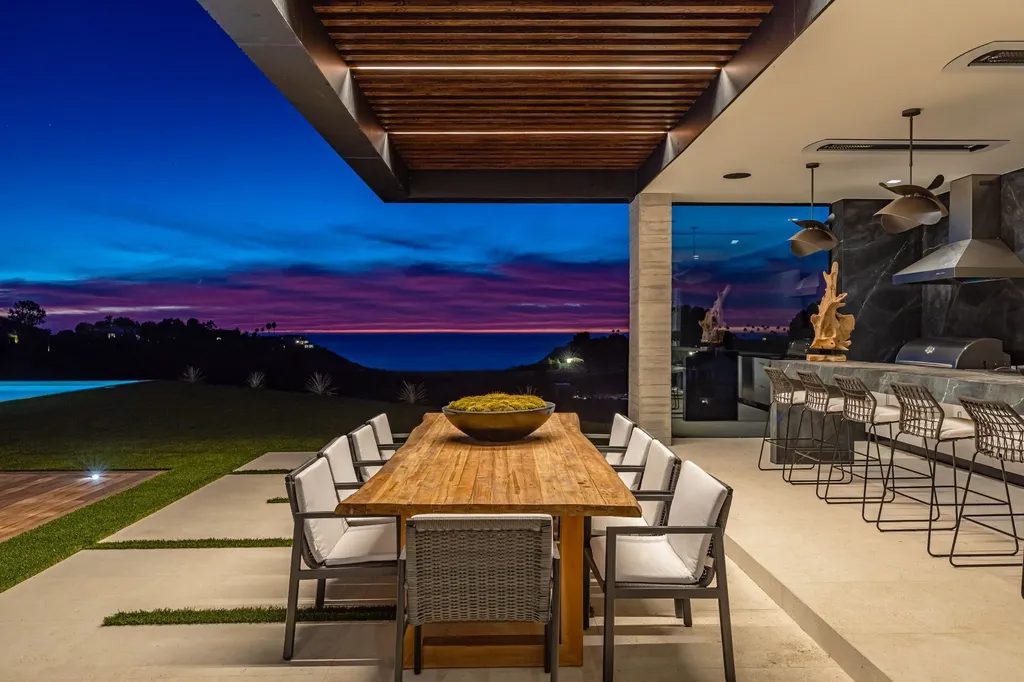 6889 Dume Drive Home in Malibu, California. Immerse yourself in the epitome of Malibu living with this newly completed 8,500 SF modern organic retreat in Little Dume. Developed and designed by Charles Kotliar and architect Doug Burdge, this ocean-view oasis offers 6 BD, 8 BA, customizations like board form concrete walls, oak woods, and curated stones. 
