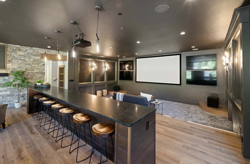 927 South Summit Creek Drive Home in Woodland Hills, Utah. Step into your custom dream home in Summit Creek, offering luxury living and unparalleled natural beauty. This magnificent residence, spanning 8,043 square feet on a .90-acre lot, presents stunning views of mountains and valleys. Floor-to-ceiling windows bathe the open-concept interior in natural light and provide uninterrupted scenic views. 