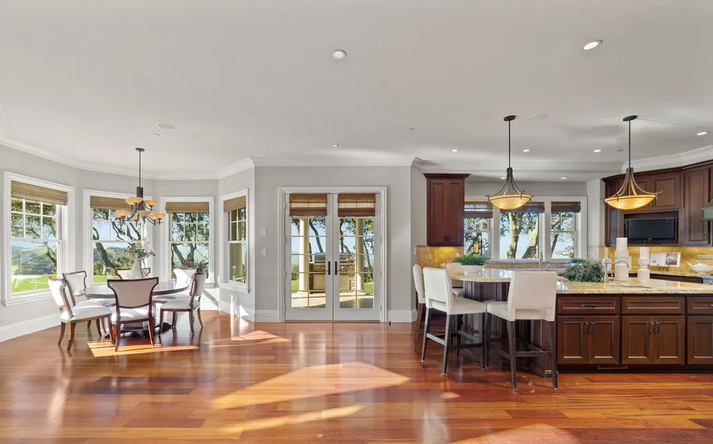 9767 Santos Ranch Road Home in Pleasanton, California. Experience the epitome of wine country living in this 4700+ SF luxury residence by Prodigy Real Estate. Boasting 4 bedrooms, 5 bathrooms, an office, and impeccable craftsmanship, this home offers a thoughtfully designed floor plan, soaring ceilings, and expansive windows to capture panoramic views. 