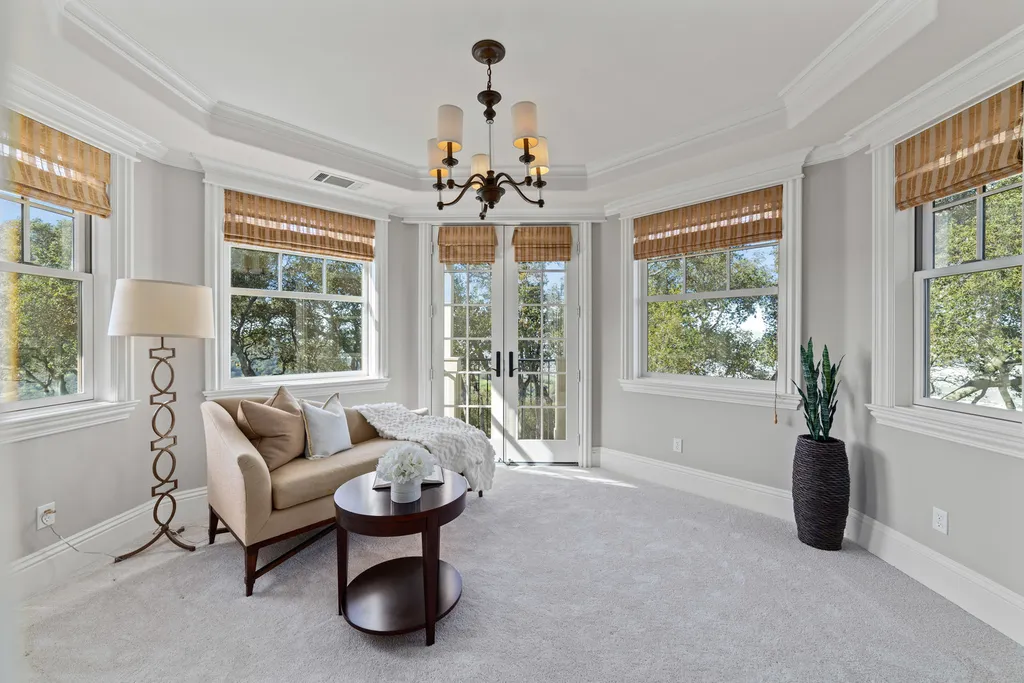 9767 Santos Ranch Road Home in Pleasanton, California. Experience the epitome of wine country living in this 4700+ SF luxury residence by Prodigy Real Estate. Boasting 4 bedrooms, 5 bathrooms, an office, and impeccable craftsmanship, this home offers a thoughtfully designed floor plan, soaring ceilings, and expansive windows to capture panoramic views. 