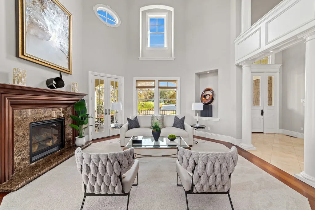 9767 Santos Ranch Road Home in Pleasanton, California. Experience the epitome of wine country living in this 4700+ SF luxury residence by Prodigy Real Estate. Boasting 4 bedrooms, 5 bathrooms, an office, and impeccable craftsmanship, this home offers a thoughtfully designed floor plan, soaring ceilings, and expansive windows to capture panoramic views. 