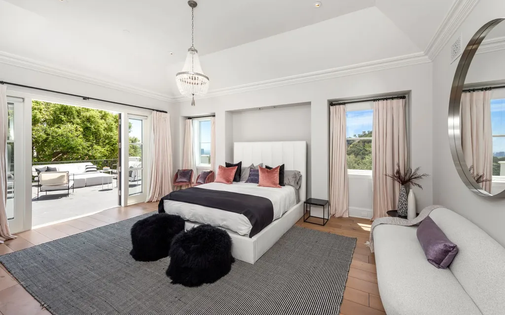 9904 Kip Drive Home in Beverly Hills, California. Enter the world of opulence and exclusivity with this celebrity compound behind gated privacy. Designed by KAA Associates, the 25,000 SF estate boasts 7 bedrooms, 13 bathrooms, lush gardens, and stunning canyon, city, and ocean views. 