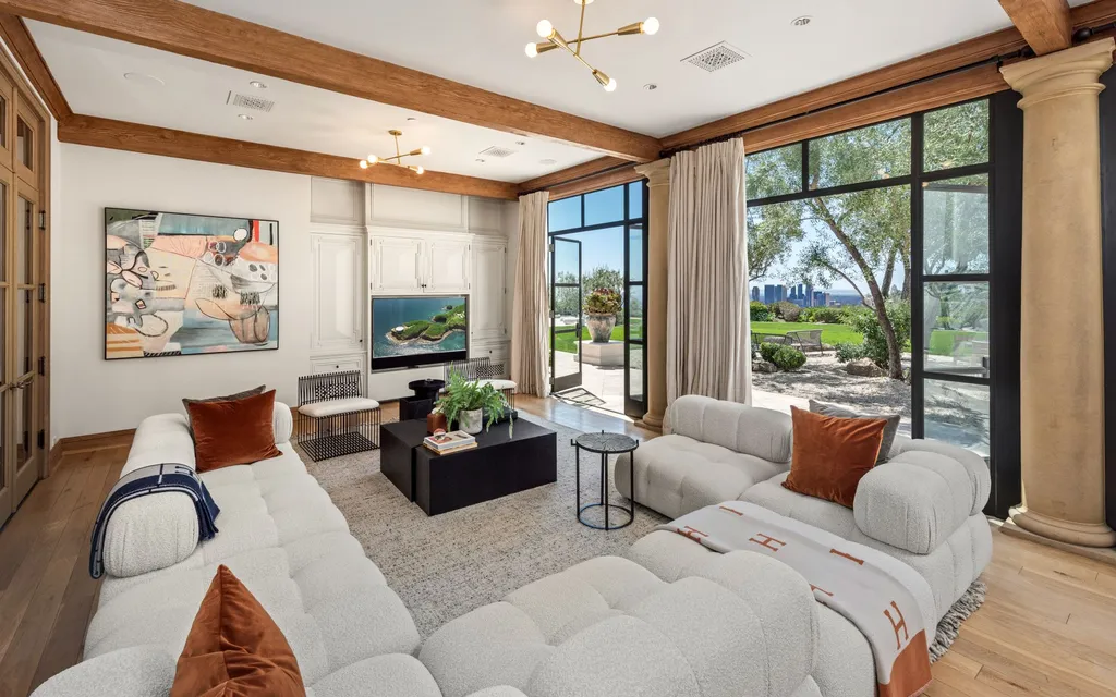 9904 Kip Drive Home in Beverly Hills, California. Enter the world of opulence and exclusivity with this celebrity compound behind gated privacy. Designed by KAA Associates, the 25,000 SF estate boasts 7 bedrooms, 13 bathrooms, lush gardens, and stunning canyon, city, and ocean views. 
