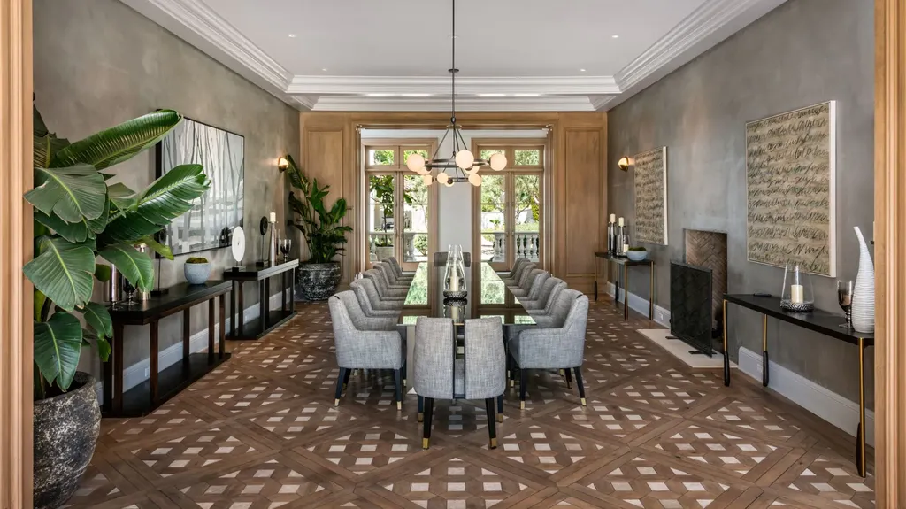 9904 Kip Drive Home in Beverly Hills, California. Enter the world of opulence and exclusivity with this celebrity compound behind gated privacy. Designed by KAA Associates, the 25,000 SF estate boasts 7 bedrooms, 13 bathrooms, lush gardens, and stunning canyon, city, and ocean views. 